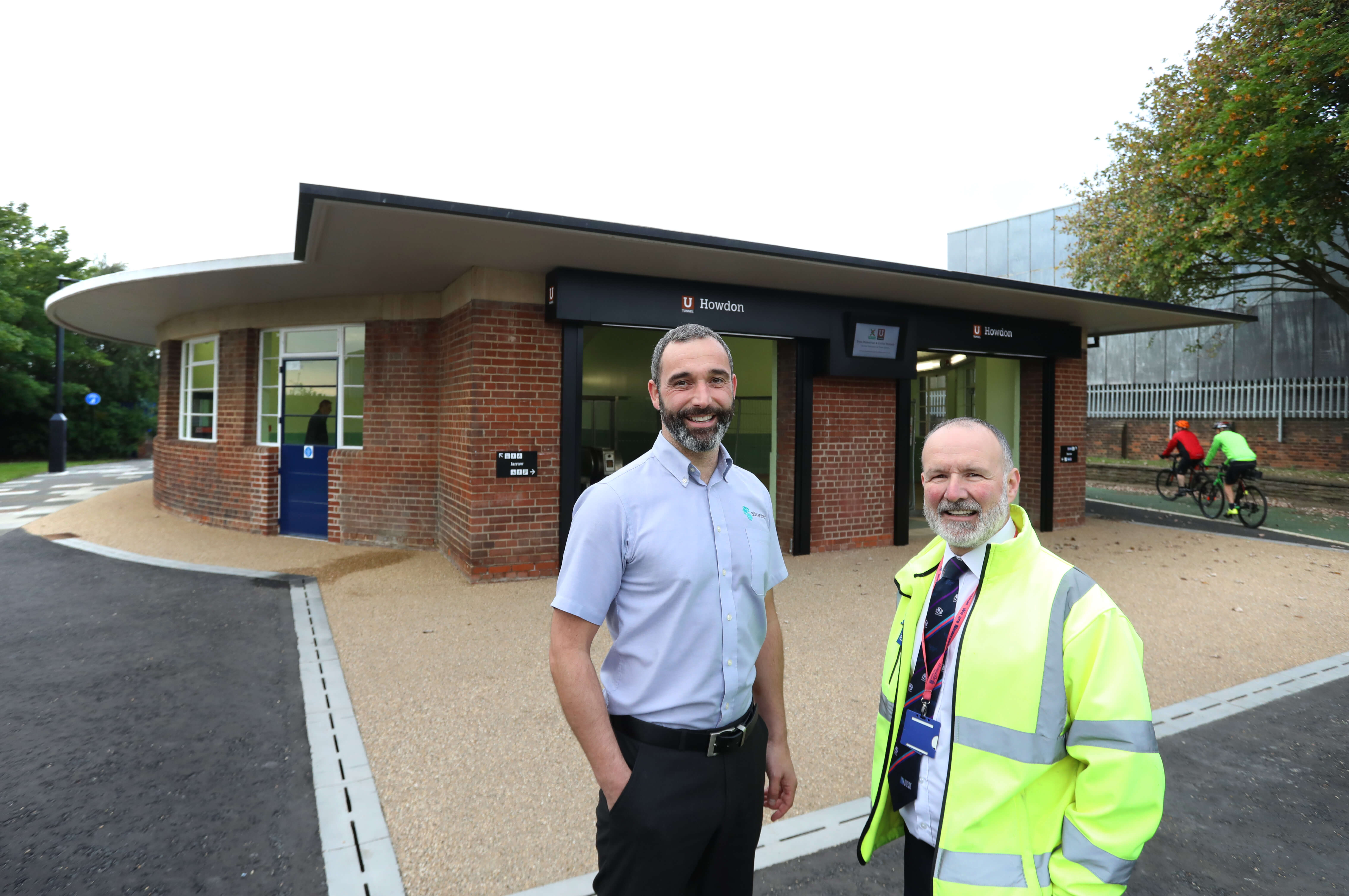 Tony Easingwood of Advantex Network Solutions alongside Alastair Swan of Newcastle City Council at the entrance to the Pedestrian Tyne Tunnel